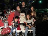 Family around Santa