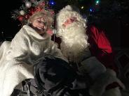 Family around Santa