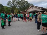 Family and Friends Gathered Around for the Town Clean Up