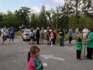 Family and Friends Gathered Around for the Town Clean Up