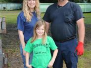 Family and Friends Gathered Around for the Town Clean Up