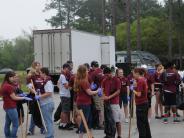 Family and Friends Gathered Around for the Town Clean Up