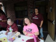Family and Friends Gathered Around for the Town Clean Up