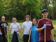 Family and Friends Gathered Around for the Town Clean Up