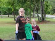 Family and Friends Gathered Around for the Town Clean Up