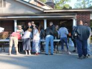 Friends and Family Gather Around for the Town Clean Up