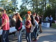 Friends and Family Gather Around for the Town Clean Up