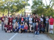 Friends and Family Gather Around for the Town Clean Up