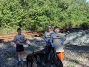 Friends and Family Gather Around for the Town Clean Up