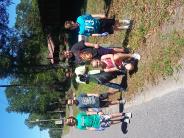 Friends and Family Gather Around for the Town Clean Up