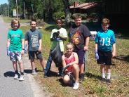 Friends and Family Gather Around for the Town Clean Up