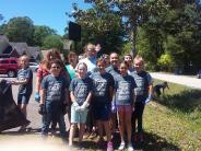 Friends and Family Gather Around for the Town Clean Up