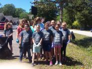 Friends and Family Gather Around for the Town Clean Up