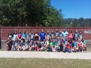 Friends and Family Gather Around for the Town Clean Up