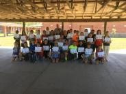 Friends and Family Gather Around for the Town Clean Up