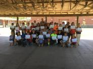 Friends and Family Gather Around for the Town Clean Up