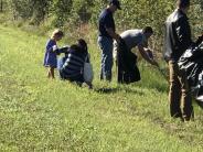 Friends and Family Gather Around for the Town Clean Up