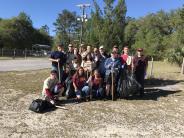 Friends and Family Gather Around for the Town Clean Up