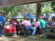 Friends and Family Gather Around for the Town Clean Up