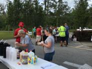 Friends and Family Gather Around for the Town Clean Up