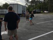 Friends and Family Gather Around for the Town Clean Up