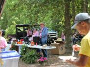 Friends and Family Gather Around for the Town Clean Up