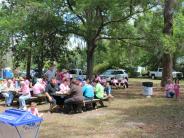 Friends and Family Gather Around for the Town Clean Up